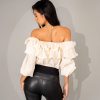Blusa con boleros grandes cuello bandeja - espalda